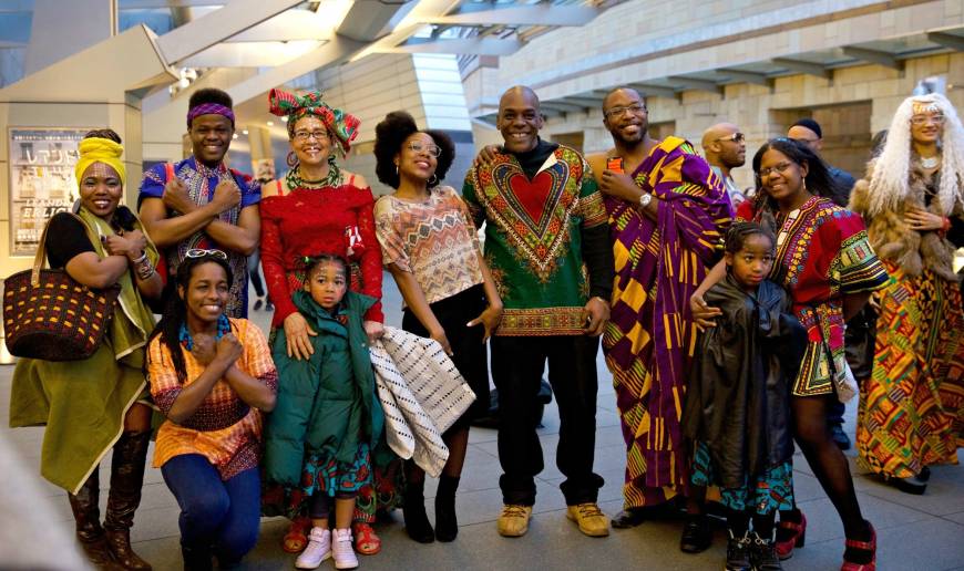 Baye McNeil (standing, fifth from left) and others assemble at Roppongi Hills in Tokyo on March 3 for a 