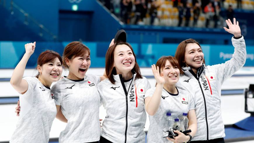 Japan’s (from left) Yurika Yoshida, Chinami Yoshida, Satsuki Fujisawa, Yumi Suzuki and Mari Motohashi celebrate after defeating Great Britain to win the bronze medal in women’s curling at the Pyeongchang Olympics on Feb. 24. Curling charms flying off shelves at shrine in Olympic bronze medalists' hometown