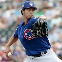 Cubs starter Yu Darvish pitches against the Rangers on Wednesday in Surprise, Arizona. Cubs starter Yu Darvish tames Rangers in six sharp innings