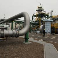 A pipe for transporting carbon dioxide to removal equipment is shown at the Tomakomai carbon, capture and storage test site in Tomakomai, Hokkaido, on March 22. Hokkaido test site outshining other carbon-capture options in race to reduce emissions