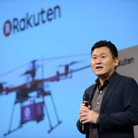 Hiroshi Mikitani, chairman and chief executive officer of Rakuten Inc., speaks during a news conference in Tokyo in October. Rakuten Inc. gets approval to become nation's fourth major wireless carrier