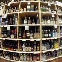 This 2016 file fisheye lens photo shows bottles of alcohol during a tour of a state liquor store in Salt Lake City, Utah. A large international study released on Thursday says adults should average no more than one alcoholic drink per day, and that means many countries’ alcohol consumption guidelines may be far too loose. When to say when: Global study says limit alcohol to just one drink a day