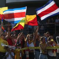 Supporters of Carlos Alvarado Quesada, presidential candidate of the ruling Citizens’ Action Party (PAC), react during the presidential election in San Jose Sunday. A divided Costa Rica votes in runoff fought over gay rights