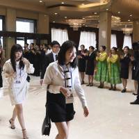 Members of the popular South Korean girl band Red Velvet arrive at a hotel in Pyongyang on Saturday. K-pop stars turn diplomatic envoys with concert dates in North Korea