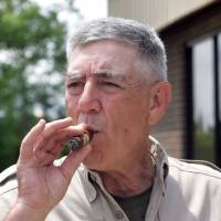 Retired Marine Gunnery Sgt. R. Lee Ermey takes a break for a smoke outside New River Air Station’s Staff NCO club in Jacksonville, North Carolina, in 2006. Ermey, a former marine who made a career in Hollywood playing hard-nosed military men like Gunnery Sgt. Hartman in Stanley Kubrick’s “Full Metal Jacket,” has died. His longtime manager Bill Rogin says he died Sunday morning from pneumonia-related complications. He was 74. 'Full Metal Jacket' drill instructor R. Lee Ermey dies at 74