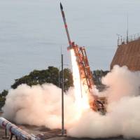 The Japan Aerospace Exploration Agency’s SS520-5 rocket is launched on Feb. 3 from Uchinoura Space Center in Kimotsuki, Kagoshima Prefecture. JAXA's orbital rocket listed by Guinness as world's smallest