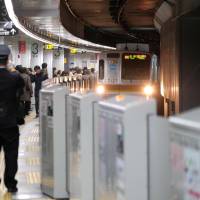 A train on the Tokyu Toyoko Line arrives at Shibuya Station in Tokyo on March 1. Millions of people across the country listen to hassha merodii, or train departure melodies, on loud speakers every day on train platforms. Japan's station jingle maestro combines his two passions: music and trains