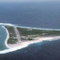 Aerial view of Minamitori Island and the runway that supports the US Coast Guard station located there. Japan team maps 'semi-infinite' trove of rare earth elements