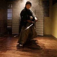 Striking a pose: Masakumo Kuwami, the 10th Grandmaster of the Tenshinryu Hyouho, ready for battle. Swordplay and samurai in Tokyo's Maruyamacho district