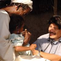 Naoyuki Kawahara treats a young girl in Sudan. Naoyuku Kawahara: Helping Sudan heal with medicine and more