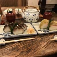 Roll up, roll up: Izuu specializes in saba-zushi (left), cured mackeral pressed into vinegar-flavored rice and wrapped in a piece of konbu seaweed. Izuu