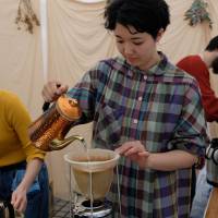 Third wave: Marico Abe of Abe Coffee makes coffee through a nel drip at the Tokyo Coffee Festival. The long pour: Tokyo Coffee Festival rounds up specialty coffee from across Japan