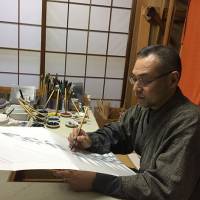 Kimono textile artist Masanobu Ota at work in his studio. Dyeing to keep Japanese textile crafts alive