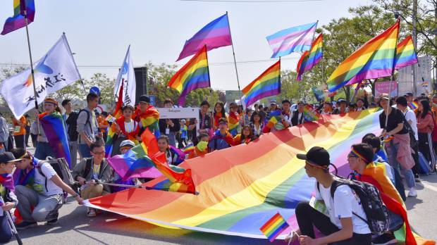 More than 20,000 people take part in a “Rainbow Marathon” to raise awareness about LGBTQ issues in Nanjing, China, on April 15. As acceptance grows, gay China wants rights