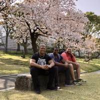 Christian Covington (left) poses for a photo with friends during his trip to Japan. Texans lineman Christian Covington recounts memorable spring vacation in Japan