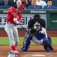 Los Angeles designated hitter Shohei Ohtani connects for a double in the second inning against Texas on Friday night. Angels off to best start since '79