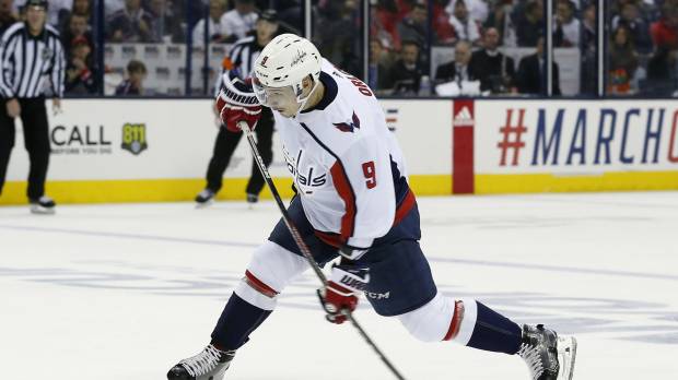 Washington’s Dmitry Orlov takes a shot against Columbus in the second period in Game 6 on Monday night. Alex Ovechkin nets pair as Capitals eliminate Blue Jackets