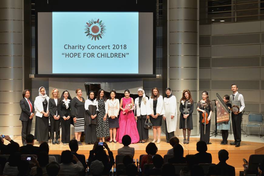 Singer Erika Colon (center) poses alongside Kaori Kono (eighth from left), wife of Foreign Minister Taro Kono; Society of Wives of Arab Ambassadors in Japan President Maali Siam (seventh from left); SWAAJ Vice President Jamila Al-Otaibi (sixth from left) and others at a SWAAJ charity concert 2018 titled 