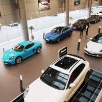 Imported cars are displayed at a showroom in Nantong, in China’s eastern Jiangsu province, on Tuesday. China announced the same day that it would cut tariffs on auto imports from July 1, in the latest sign of a thaw in trade frictions with the United States. China slashes auto import tariffs in boost to overseas carmakers