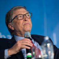 Bill Gates speaks during a discussion at the IMF/World Bank spring meeting in Washington on April 21. Bill Gates mocks Trump for not knowing difference between HIV and HPV