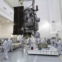 Technicians and engineers move the National Oceanic and Atmospheric Administration’s Geostationary Operational Environmental Satellite-S (GOES-S) to a work stand at Astrotech Space Operations in Titusville, Florida, near Kennedy Space Center, on Dec. 6. New U.S. weather satellite suffers cooling problem
