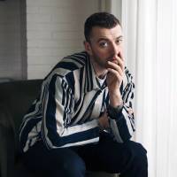 Musician Sam Smith, noted for songs with a low happiness index, poses for a portrait in New York to promote his album “The Thrill of It All” on Nov. 2. Happiness makes hit songs: study