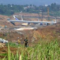 Construction of a toll road from Jakarta to Lido, the planned location for a theme park linked to companies with business interests tied to U.S. President Donald Trump, is seen in Indonesia’s West Java province in November. Trump Indonesia project latest stop on China's Belt and Road