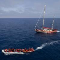 Refugees and migrants are rescued by members of the Spanish NGO Proactiva Open Arms, after leaving Libya trying to reach European soil aboard an overcrowded rubber boat, north of Libyan coast Sunday. In total 105 refugees and migrants from Bangladesh, Egypt, Nigeria, Marrocos, Gana, Pakistan, Sudan, Libya, Eritrea and Senegal were rescued in the overcrowded rubber boat. Spain rescues 476 migrants crossing Mediterranean after smugglers removed boat's engine