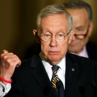 Senate Minority Leader Harry Reid (D-NV) speaks with reporters regarding a stop-gap funding bill to avoid a federal government shutdown, on Capitol Hill in Washington in 2016. Ex-Nevada Sen. Harry Reid has cancerous tumor removed from pancreas