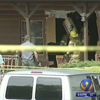 This frame grab from video provided by WSOC-TV 9 in Charlotte, North Carolina, shows a scene where a man intentionally rammed a vehicle into a restaurant busy with a lunchtime crowd Sunday, killing his daughter and another person and injuring several others, in Bessemer City, according to authorities. Man purposely rams SUV into North Carolina eatery, killing daughter and another person