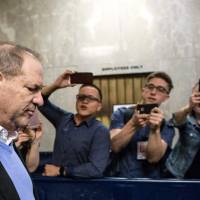 Harvey Weinstein leaves the Manhattan Criminal Court on Friday in New York. Vindication and triumph, but also fear: Weinstein accusers react