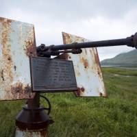 In this 2017 photo provided by the U.S. Fish and Wildlife Service, an artillery monument sits above Massacre Bay on Attu Island, Alaska. One of the bloodiest World War II battles in the Pacific was waged 75 years ago this month on Attu Island in Alaska’s Aleutian Islands. American forces reclaimed the island 11 months after Japan seized it. After 75 years, 'forgotten' hand-to-hand WWII battle of Attu still haunts vets
