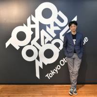 Naomitsu Kodaka, CEO of Tokyo Otaku Mode Inc., poses at the firm’s headquarters in Tokyo on April 25. Bitcoin for <em>otaku</em>: Tokyo startup to launch cryptocurrency to serve communities