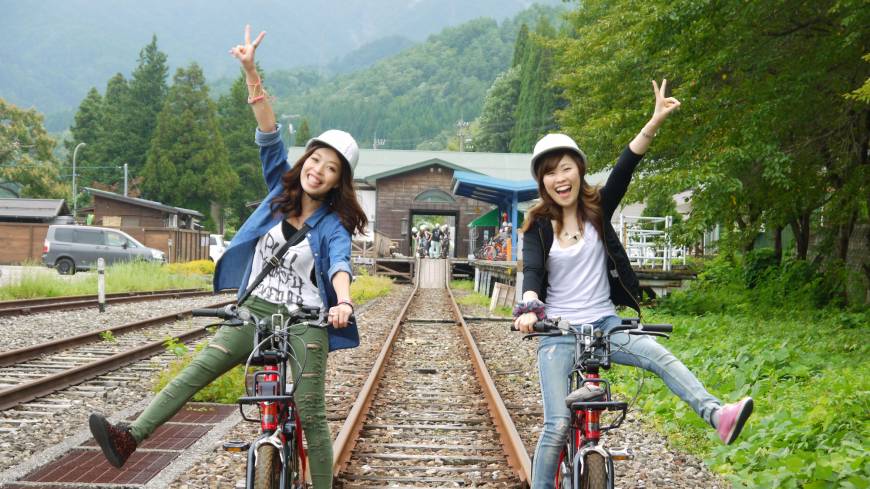 Tourists are seen pedaling a rail bike that runs on the abandoned Kamioka Railway in Hida, Gifu Prefecture. All aboard: Exploring Japan's abandoned train lines