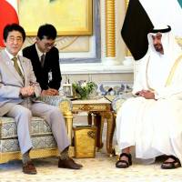 Abu Dhabi’s Crown Prince Sheikh Mohammed bin Zayed Al Nahyan (right) and Prime Minister Shinzo Abe hold talks in Abu Dhabi on Monday. Japan and UAE agree to expand cooperation during Abe's visit