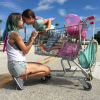 We are family: Bria Vinaite and Brooklynn Prince play a mother and daughter living out of a motel in “The Florida Project.” 'The Florida Project' looks at life's hardships through the eyes of a child
