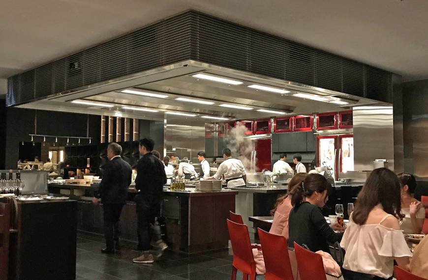 Test Kitchen H Open air theater: Watch as the chefs prepare the food in Test Kitchen H's vast kitchen. | ROBBIE SWINNERTON