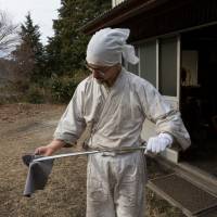 Yasha Yukawa checks his handiwork at his forge in the valleys around Hofu in Yamaguchi Prefecture. Swedish-Japanese swordsmith forges his destiny in Yamaguchi after trial by fire