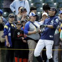Ichiro Suzuki, laughing as Mariners fans stand near the field before Sunday’s game in Seattle, will serve as the team’s bench coach this weekend. Ichiro to fill in as Mariners bench coach for weekend series