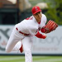 Angels starter Shohei Ohtani delivers a pitch against the Rays during the third inning on Sunday in Anaheim, California. Shohei Ohtani strikes out nine to lead Angels past Rays