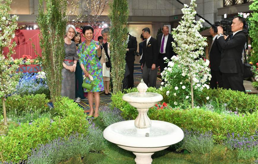 Elizabeth von Werthern (left), wife of the German ambassador examines a garden with Princess Takamado. The World Gardening Fair is on display in Tokyo through May 6.
