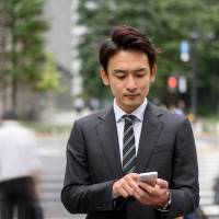 The Japan Fair Trade Commission believes the payment plans offered by KDDI Corp. and SoftBank Group Corp. for the iPhone and other mobile devices may deprive customers of options to choose other carriers. Japan's antitrust watchdog agency may order corrective measures against carriers' 4-year smartphone plans