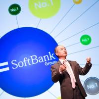 Masayoshi Son, chairman and chief executive officer of SoftBank Group Corp., gestures during a news conference in Tokyo in May. Japanese bond investors ponder a future SoftBank without Masayoshi Son