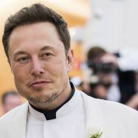 Elon Musk attends The Metropolitan Museum of Art’s Costume Institute benefit gala celebrating the opening of the “Heavenly Bodies: Fashion and the Catholic Imagination” exhibition in New York May 7. Tesla Inc. is laying off about 3,600 white-collar workers as it slashes costs in an effort to become profitable. Musk said in an e-mail to workers Tuesday that the cuts amount to about 9 percent of the company’s workforce of 40,000. Tesla cuts 9% of workforce, mainly salaried ranks, in bid to post profit