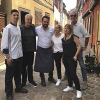 This handout image taken on June 4 and released by Jean-David Schroeder on Friday shows Julien Schroeder (center), the chef of the Petite Venise restaurant in Colmar, eastern France, posing with his wife, Virginie Schroeder (center right), Eric Ripert (second left) and Anthony Bourdain (right). A prosecutor in France says Anthony Bourdain apparently hanged himself in a luxury hotel in the small town of Kaysersberg. French media quoted Colmar prosecutor Christian de Rocquigny du Fayel as saying that “at this stage” nothing suggests another person was involved in the death Friday of the American celebrity chef and food writer. French prosecutor: No evidence of foul play in Anthony Bourdain's death