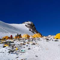 Trash surrounds Mount Everest’s Camp 4 on May 21. Mount Everest becomes a high-altitude rubbish dump