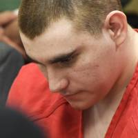 School shooting suspect Nikolas Cruz sits in the Broward County courthouse in Fort Lauderdale, Florida, June 8. Defense attorneys for Cruz are asking a judge to order investigators to preserve most evidence in the case, except for the building where the Valentine’s Day massacre took place. FBI flags signs that may help detect mass shooters, cites 'multiple stessors' over diagnosable mental ills