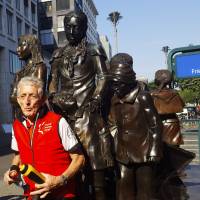 Paul Alexander stands in front of a commemorative statue dedicated to perpetuating the memory of the ‘Kindertransport’ (children transport), near the train station Friedrichstrasse in Berlin, Sunday. Paul Alexander, one of the children whose life was saved with the transports from Berlin to London, attends a memorial bike ride from Berlin to London to mark the Kindertransport’s 80th anniversary. Cyclists retrace 1938 Jewish 'Kindertransport' child refugee journey to Britain