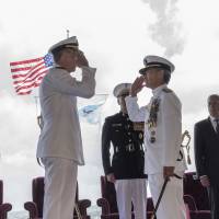 Adm. Phil Davidson (left) relieves Adm. Harry Harris as commander of U.S. Pacific Command on May 30 at Joint Base Pearl Harbor-Hickam in Hawaii. Trump nominee for ambassador to South Korea, Harry Harris, backs 'pause' in military exercises