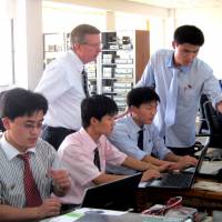Students of Pyongyang University of Science and Technology attend a class in Pyongyang. Crisis-plagued private Pyongyang university seeks revival after Trump-Kim summit